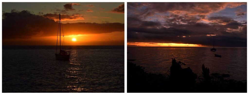 Barca a vela sul mare calmo al tramonto alle Fiji, con cielo dai colori caldi